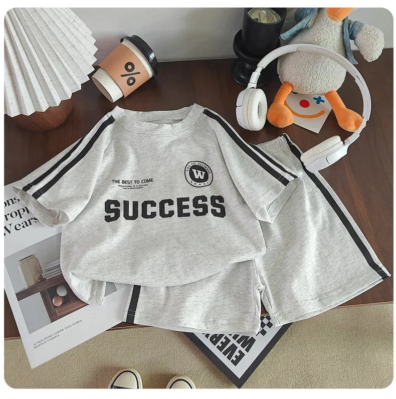 2026 New Summer Sporty Style Children Sets Letter Pattern Tee+Striped Shorts 2Pcs Clothes Short Sleeve Cotton Boys Girls Suit
