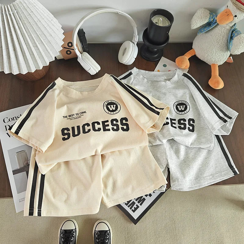 2026 New Summer Sporty Style Children Sets Letter Pattern Tee+Striped Shorts 2Pcs Clothes Short Sleeve Cotton Boys Girls Suit
