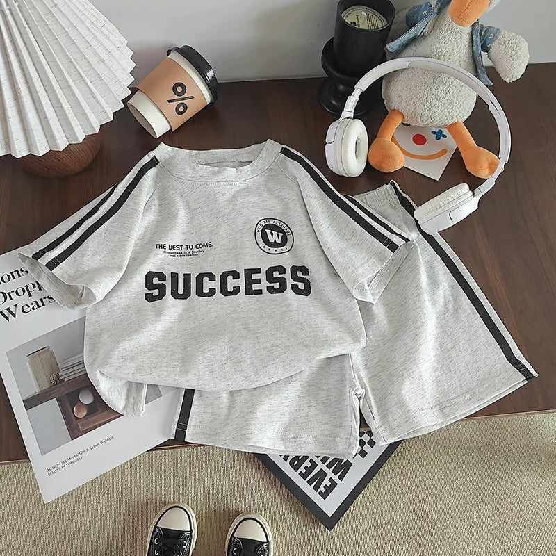 2026 New Summer Sporty Style Children Sets Letter Pattern Tee+Striped Shorts 2Pcs Clothes Short Sleeve Cotton Boys Girls Suit